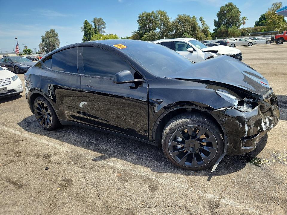 Photo 4 from auction – 2023 TESLA MODEL Y with VIN 7SAYGDEE5PA182008
