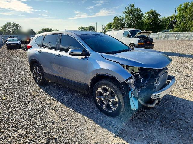 Photo 4 from auction – 2018 HONDA CR-V with VIN 7FARW2H5XJE012231