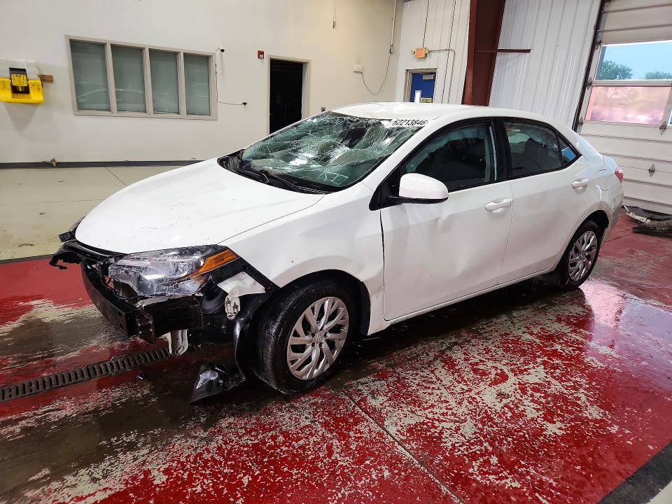 TOYOTA COROLLA 2018 with VIN 5YFBURHE0JP790165 - Photo from auction