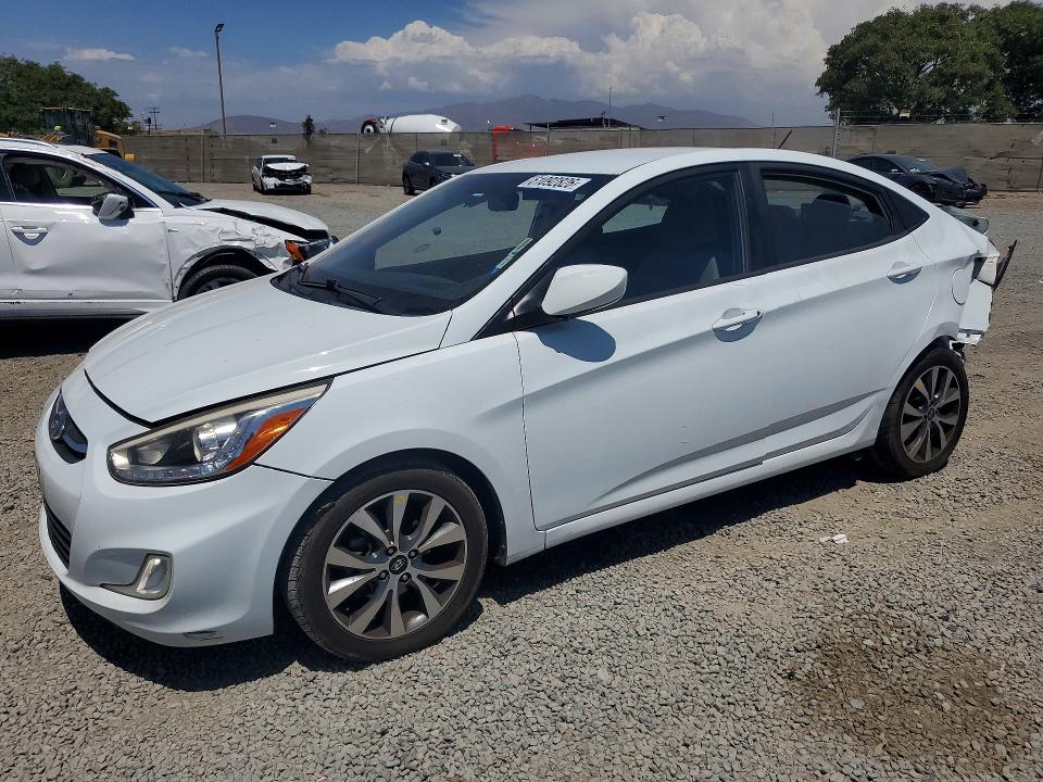 HYUNDAI ACCENT 2015 с VIN KMHCU4AE3FU822985 - Снимка от търг