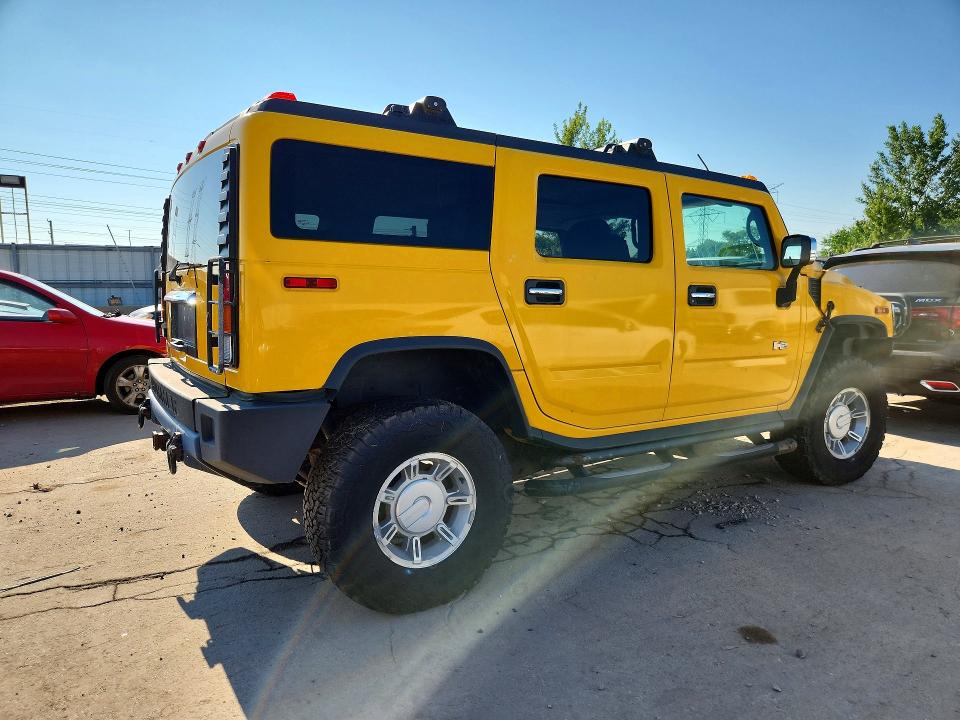 Снимка 3 от търг – 2003 HUMMER H2 с VIN 5GRGN23U73H129111