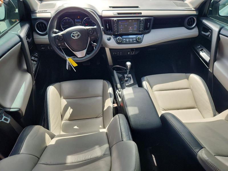 Photo 8 from auction – 2018 TOYOTA RAV4 with VIN 2T3YFREV2JW435819
