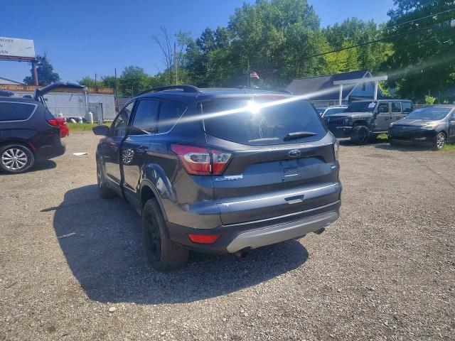 Photo 3 from auction – 2017 FORD ESCAPE with VIN 1FMCU9G90HUC73210