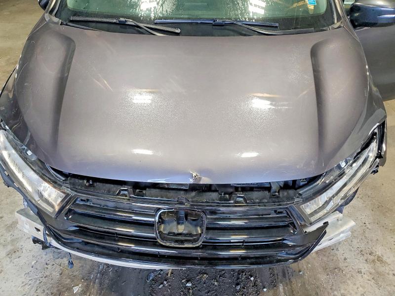 Photo 12 from auction – 2023 HONDA ODYSSEY with VIN 5FNRL6H82PB017910
