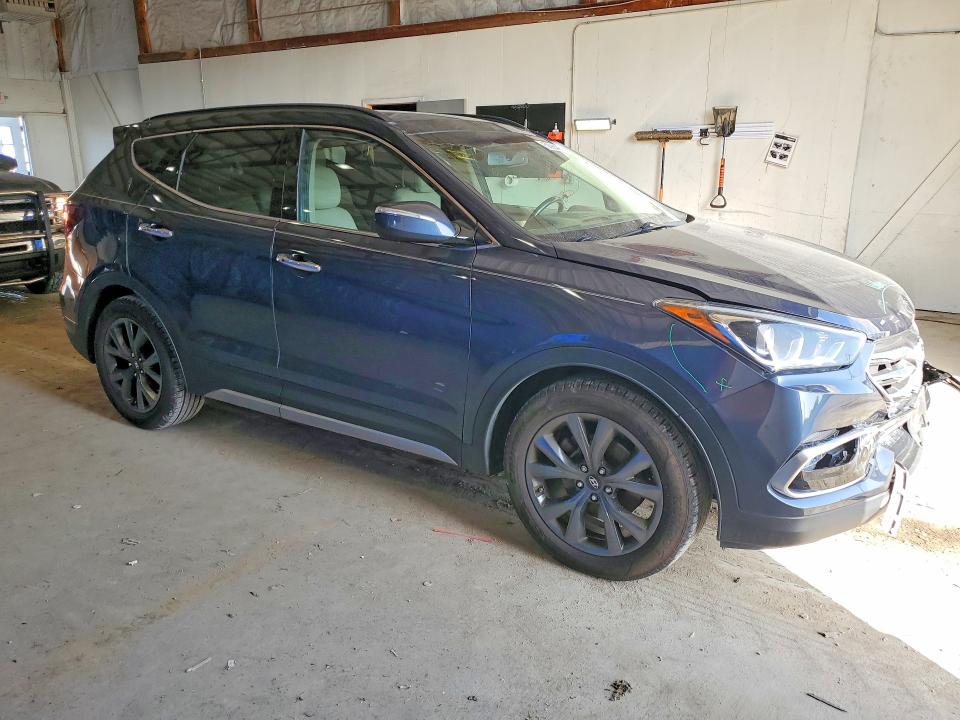 Photo 4 from auction – 2017 HYUNDAI SANTA FE SPORT with VIN 5XYZWDLA9HG452214