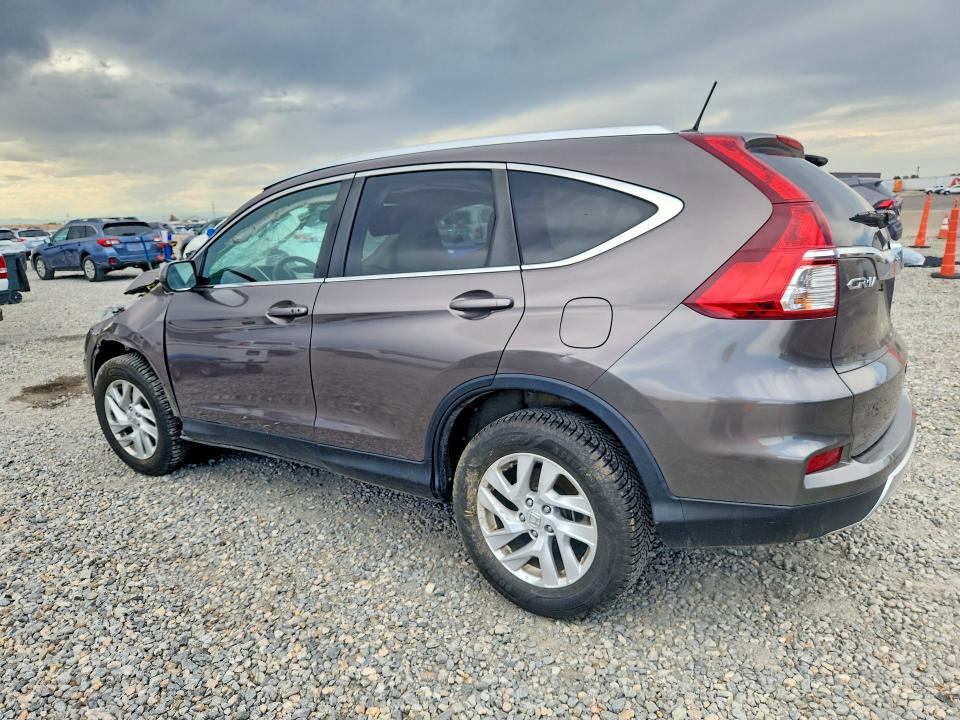 Photo 2 from auction – 2016 HONDA CR-V with VIN 2HKRM4H71GH626268