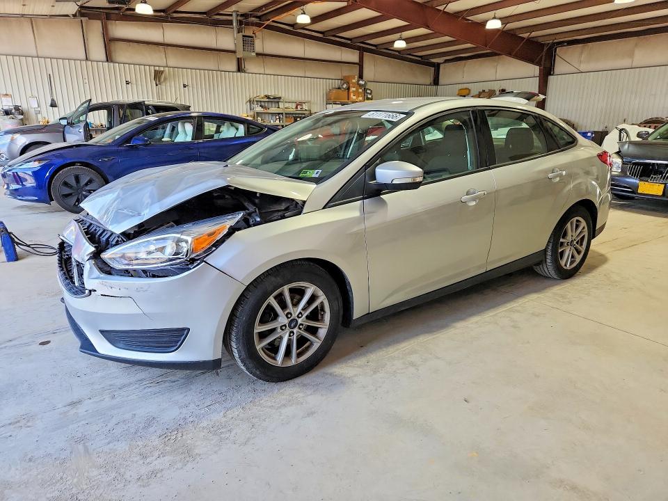 FORD FOCUS 2018 with VIN 1FADP3F28JL203795 - Photo from auction