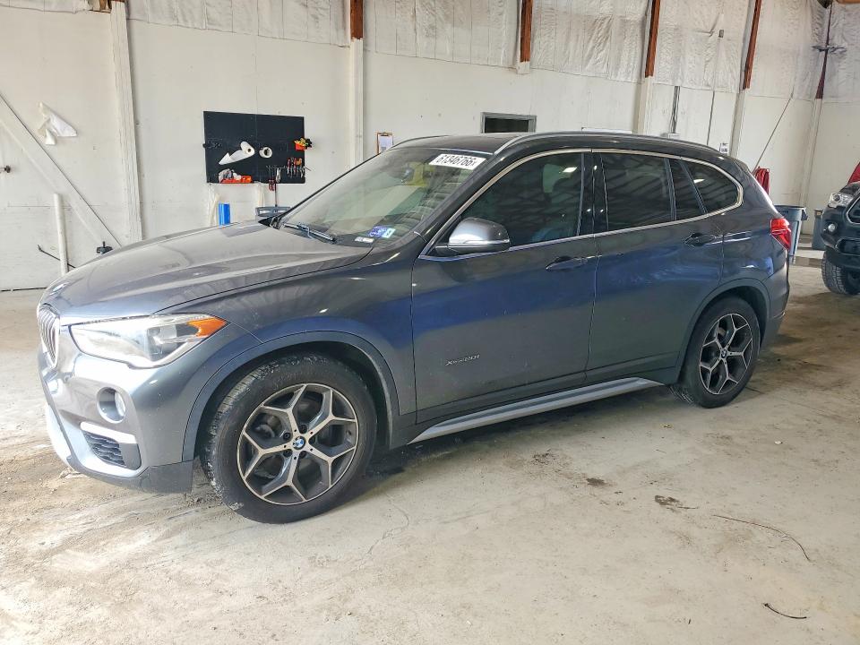 BMW X1 2017 with VIN WBXHT3C33H5F78762 - Photo from auction