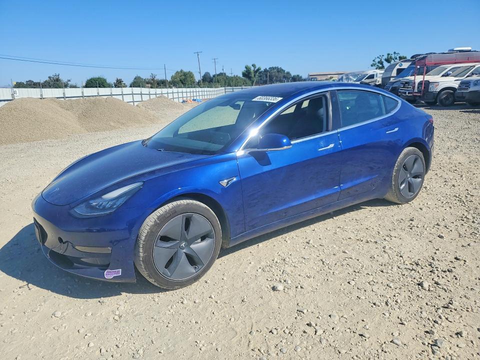 TESLA MODEL 3 2018 with VIN 5YJ3E1EA3JF161001 - Photo from auction
