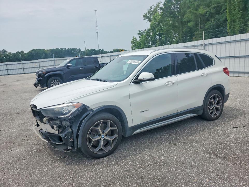 BMW X1 2016 with VIN WBXHT3C35GP884586 - Photo from auction