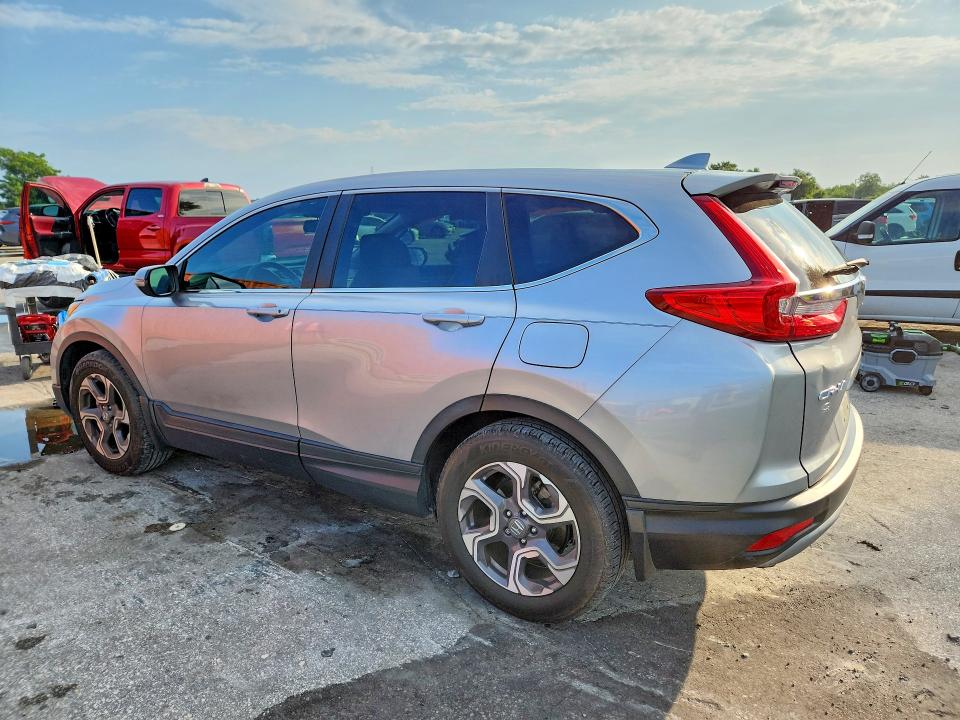 Photo 2 from auction – 2018 HONDA CR-V with VIN 7FARW1H83JE038626