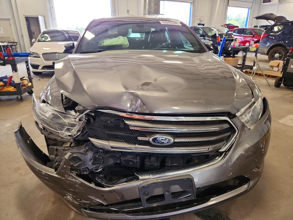 Photo 5 from auction – 2014 FORD TAURUS with VIN 1FAHP2J89EG125680