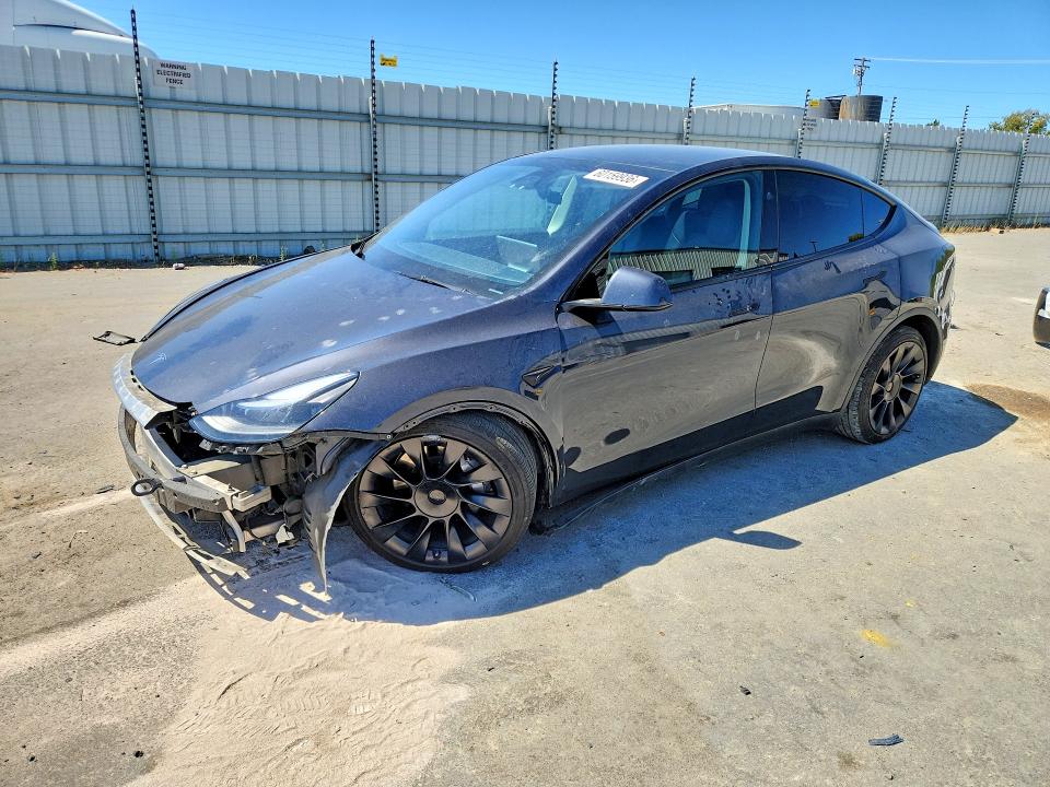 TESLA MODEL Y 2024 with VIN 7SAYGDEE9RF065005 - Photo from auction