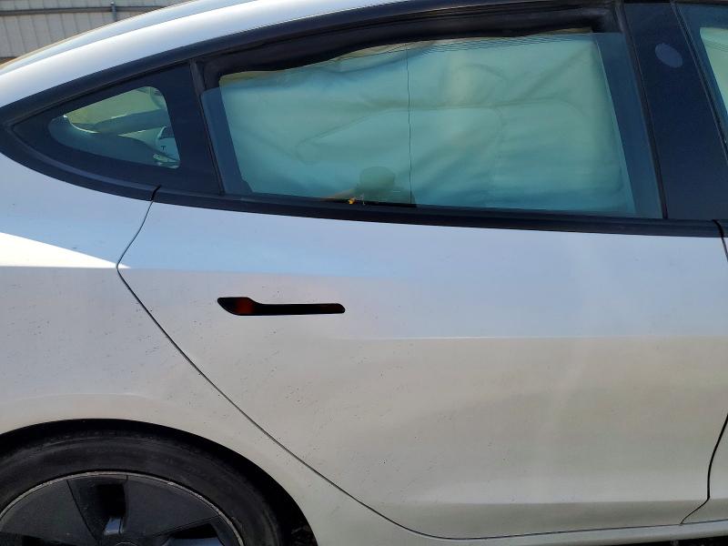 Photo 10 from auction – 2022 TESLA MODEL 3 with VIN 5YJ3E1EA8NF357084
