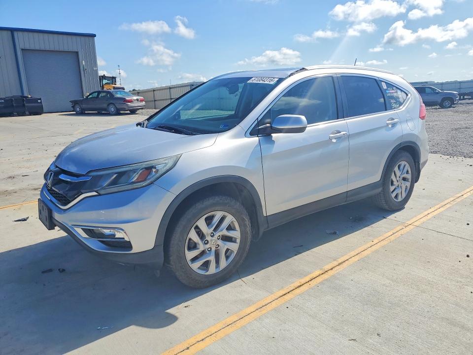 Photo 1 from auction – 2015 HONDA CR-V with VIN 2HKRM4H74FH615859