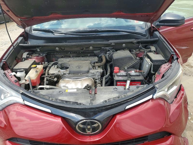 Photo 12 from auction – 2018 TOYOTA RAV4 with VIN 2T3BFREVXJW708060