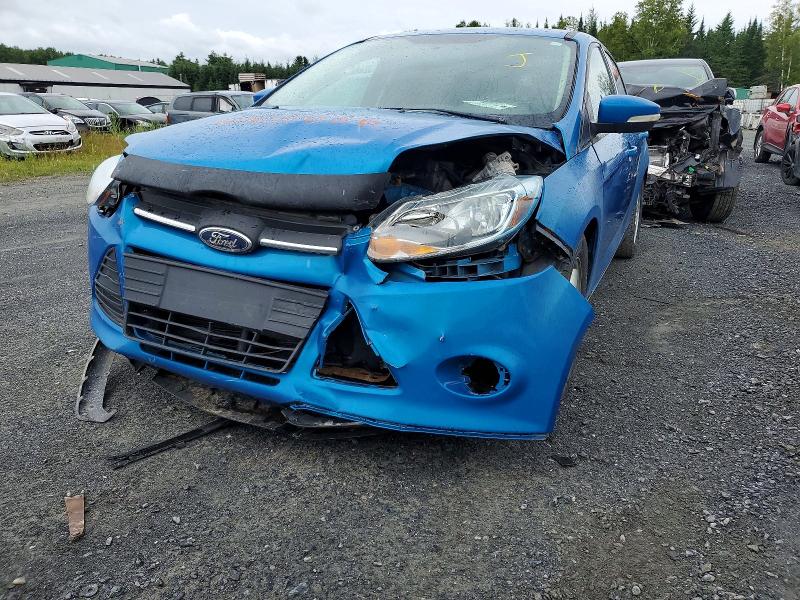 Photo 12 from auction – 2014 FORD FOCUS with VIN 1FADP3F2XEL250056