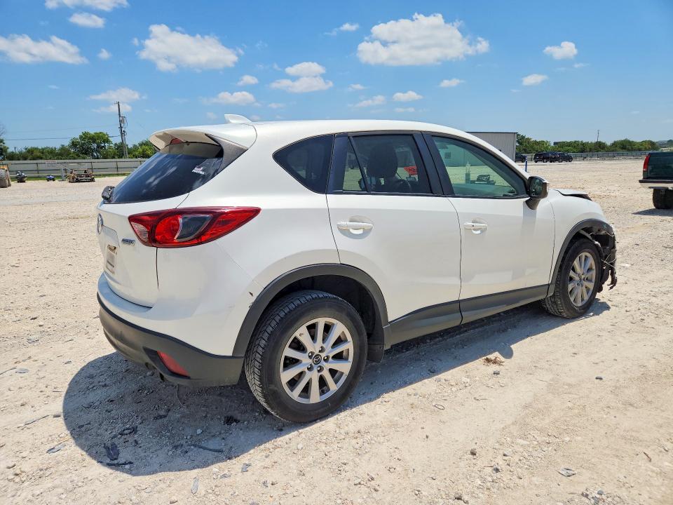 Photo 3 from auction – 2015 MAZDA CX-5 with VIN JM3KE2CY1F0531103