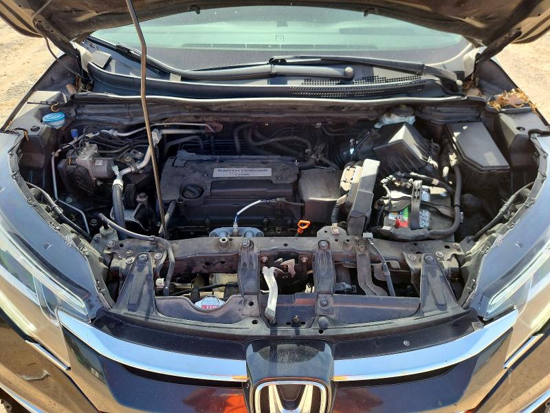 Photo 11 from auction – 2015 HONDA CR-V with VIN 2HKRM3H55FH540629