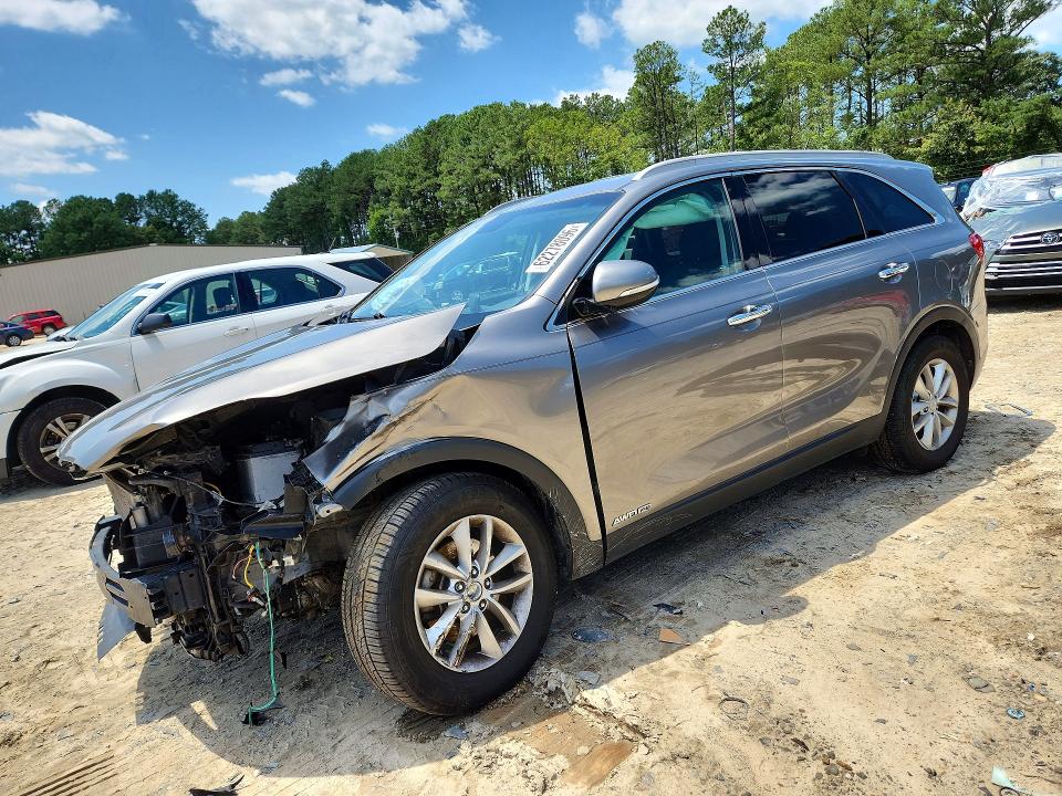 KIA SORENTO 2017 with VIN 5XYPGDA55HG208327 - Photo from auction