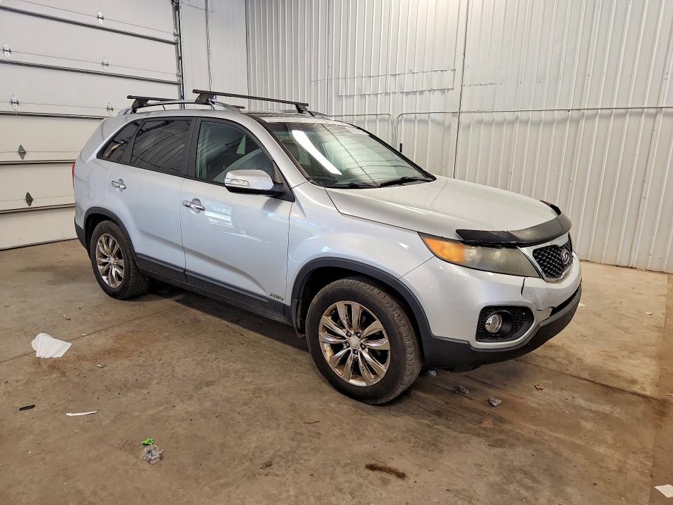 Photo 4 from auction – 2011 KIA SORENTO with VIN 5XYKUDA25BG134584