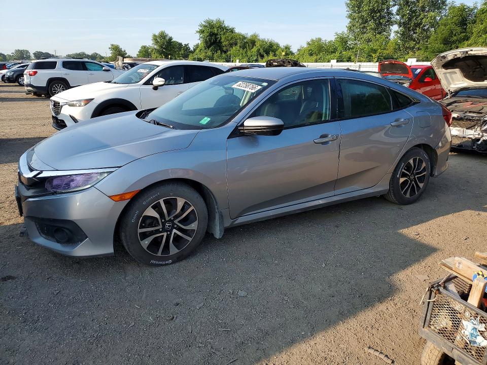 HONDA CIVIC 2018 with VIN 2HGFC2F64JH032330 - Photo from auction