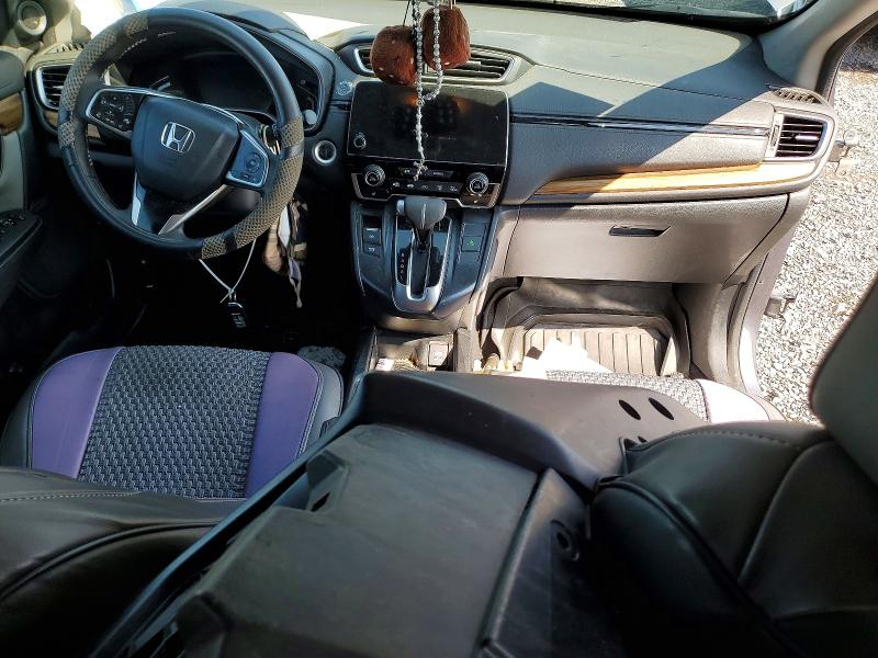 Photo 8 from auction – 2018 HONDA CR-V with VIN 7FARW2H52JE067515