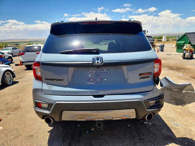 Photo 6 from auction – 2023 HONDA PASSPORT with VIN 5FNYF8H69PB034278