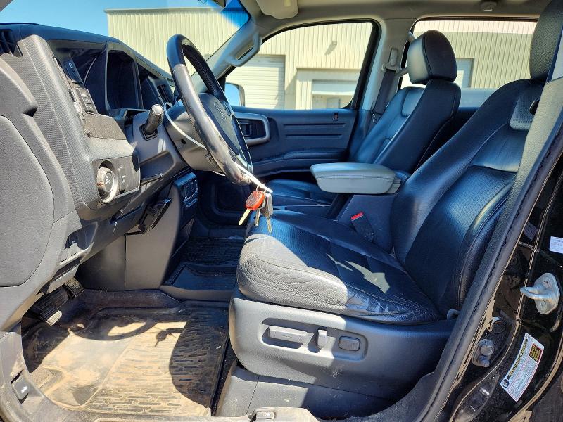 Photo 7 from auction – 2010 HONDA RIDGELINE with VIN 5FPYK1F52AB013543