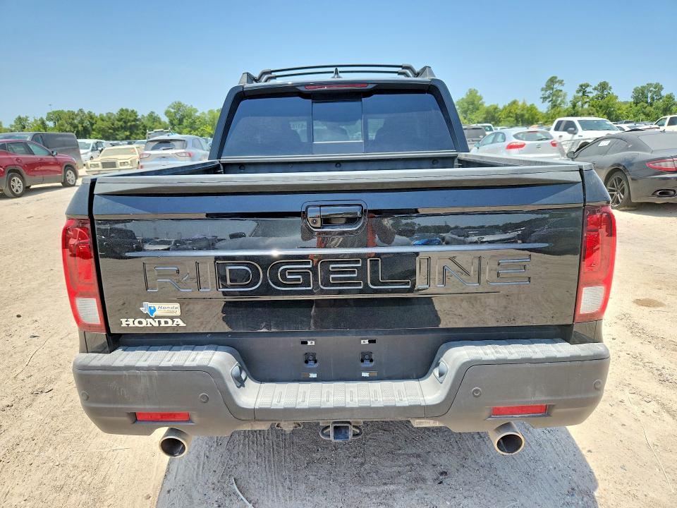 Photo 6 from auction – 2025 HONDA RIDGELINE with VIN 5FPYK3F84SB017682