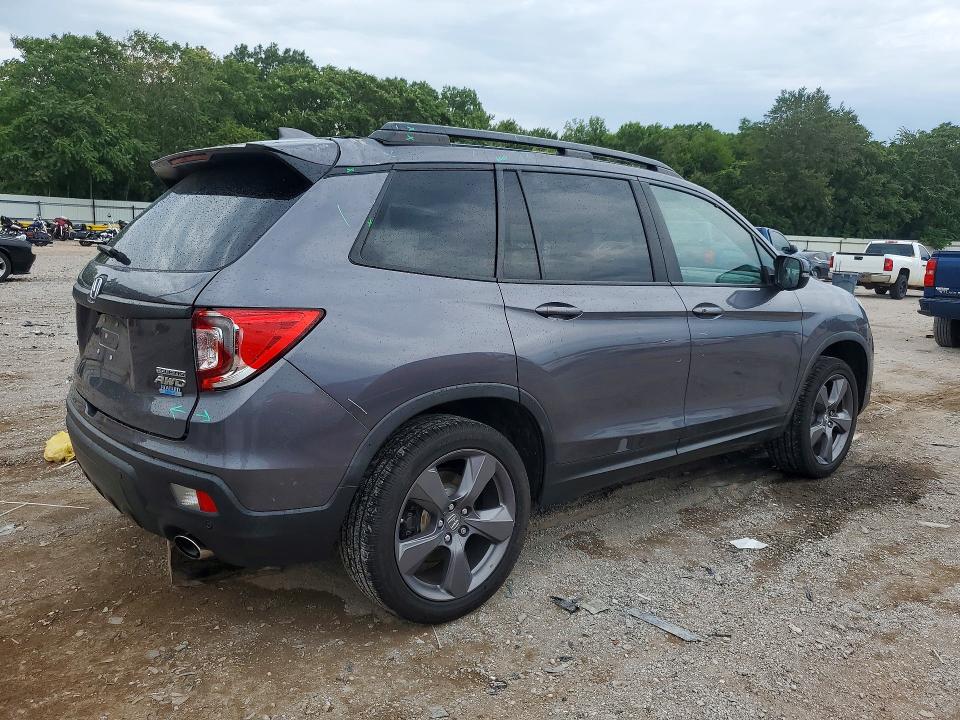Photo 3 from auction – 2021 HONDA PASSPORT with VIN 5FNYF8H94MB020973