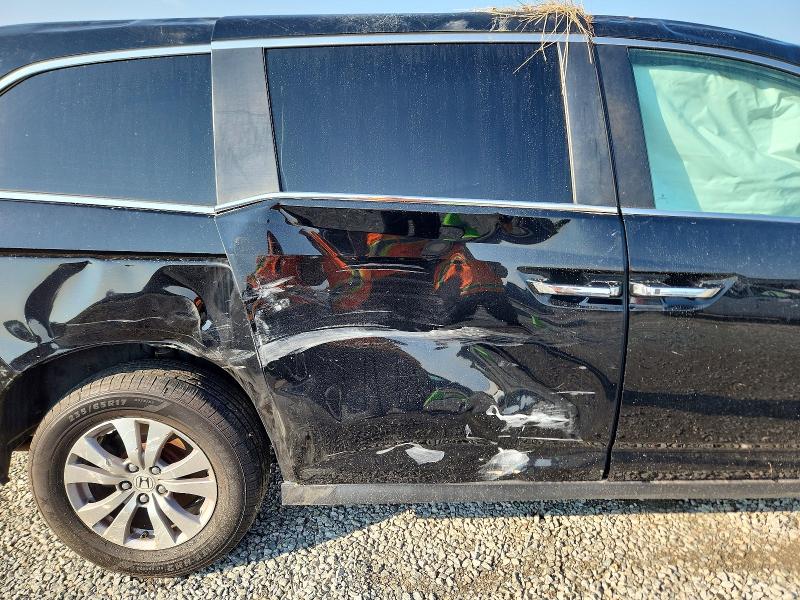 Photo 11 from auction – 2017 HONDA ODYSSEY with VIN 5FNRL5H34HB025815