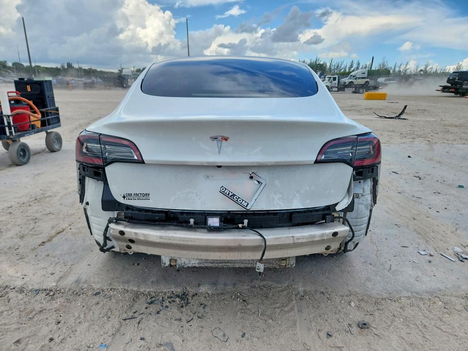 Снимка 6 от търг – 2021 TESLA MODEL 3 с VIN 5YJ3E1EA1MF086027