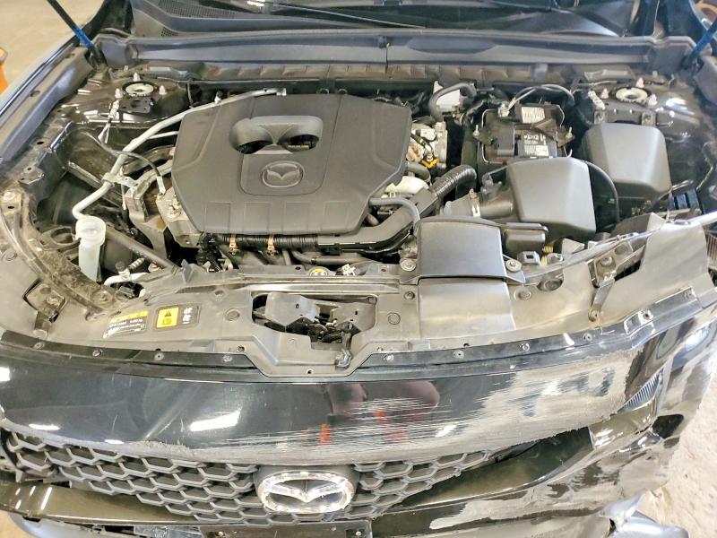 Photo 12 from auction – 2025 MAZDA CX-50 with VIN 7MMVABBMXSN320687