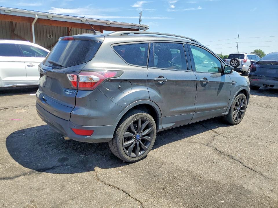 Photo 3 from auction – 2017 FORD ESCAPE with VIN 1FMCU9JD7HUA79920