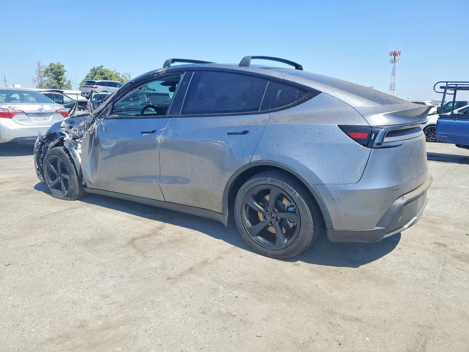 Photo 2 from auction – 2026 TESLA MODEL  Y with VIN 7SAYGDEE6TF341079