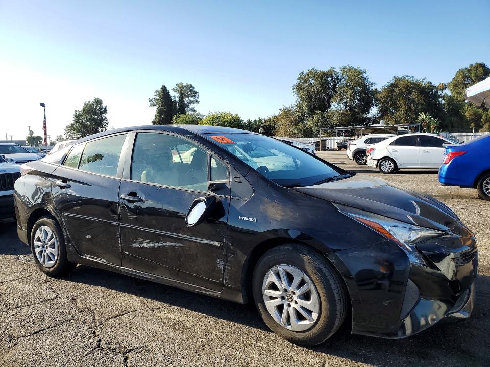 Photo 4 from auction – 2016 TOYOTA PRIUS with VIN JTDKBRFUXG3010786