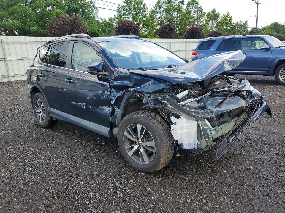 Photo 4 from auction – 2018 TOYOTA RAV4 with VIN 2T3RFREV7JW755030