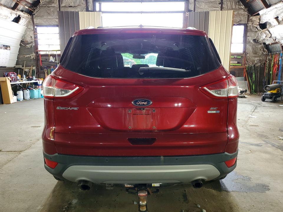 Photo 6 from auction – 2016 FORD ESCAPE with VIN 1FMCU9GX8GUA11027