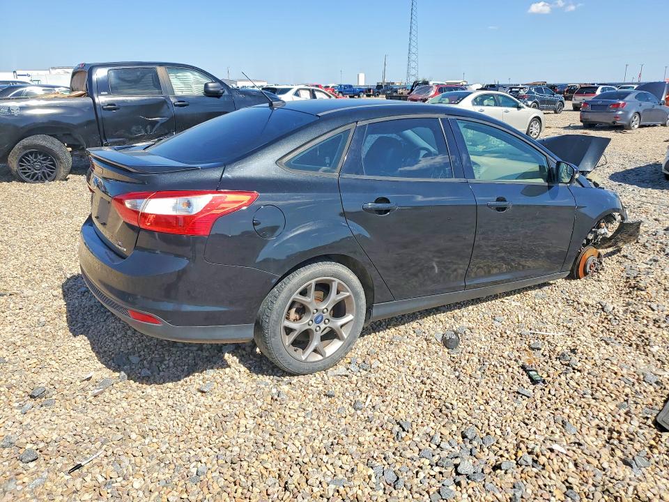 Photo 3 from auction – 2014 FORD FOCUS with VIN 1FADP3F26EL324234
