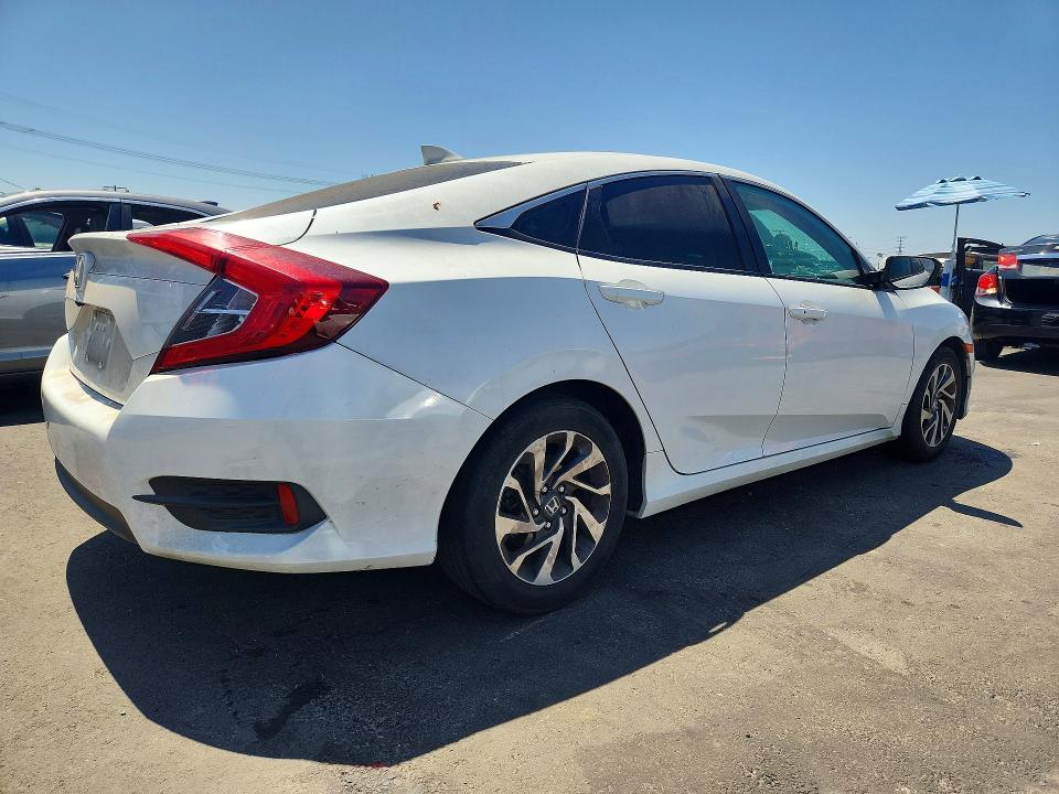 Photo 3 from auction – 2018 HONDA CIVIC with VIN 2HGFC2F75JH543893