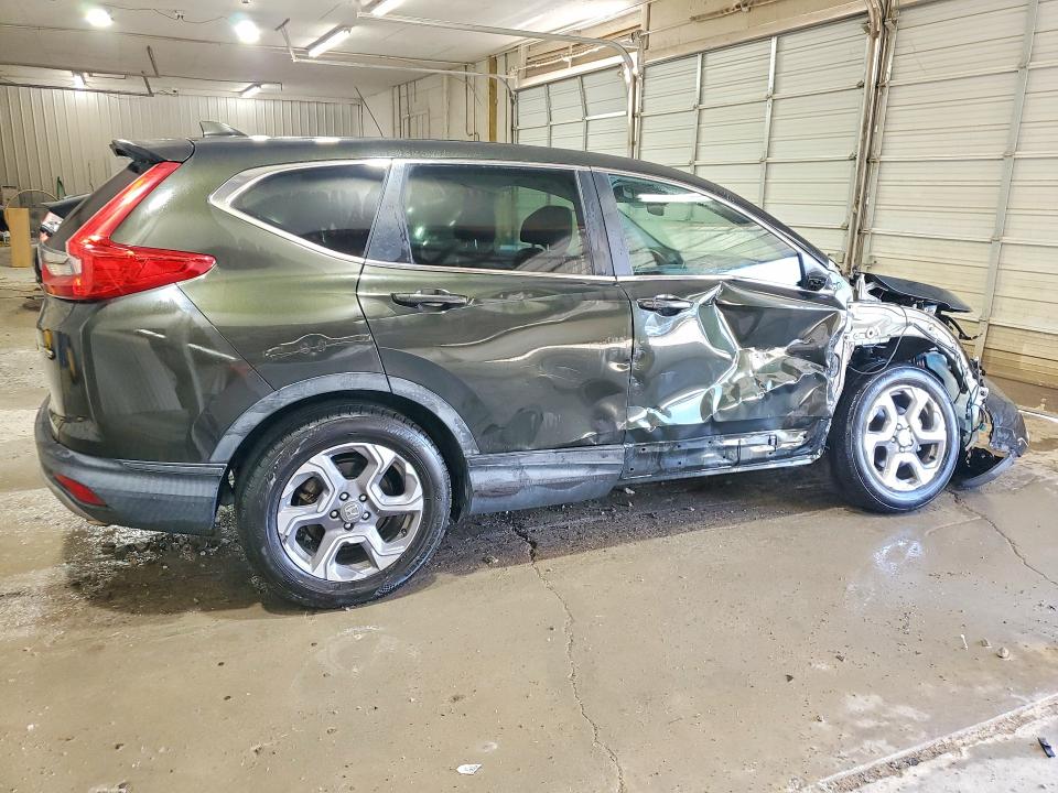 Photo 3 from auction – 2018 HONDA CR-V with VIN 7FARW2H58JE095500