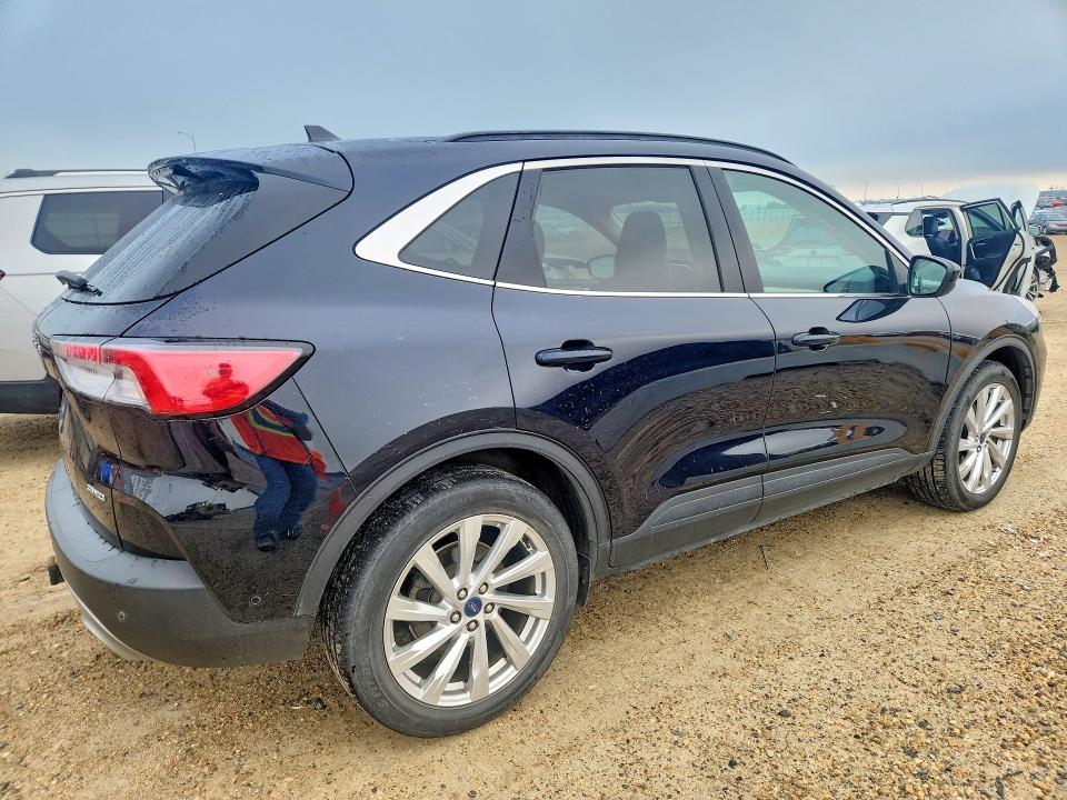 Photo 3 from auction – 2021 FORD ESCAPE with VIN 1FMCU9J93MUA72727