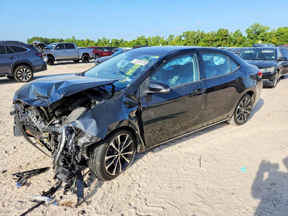 TOYOTA COROLLA 2017 with VIN 5YFBURHE7HP727185 - Photo from auction