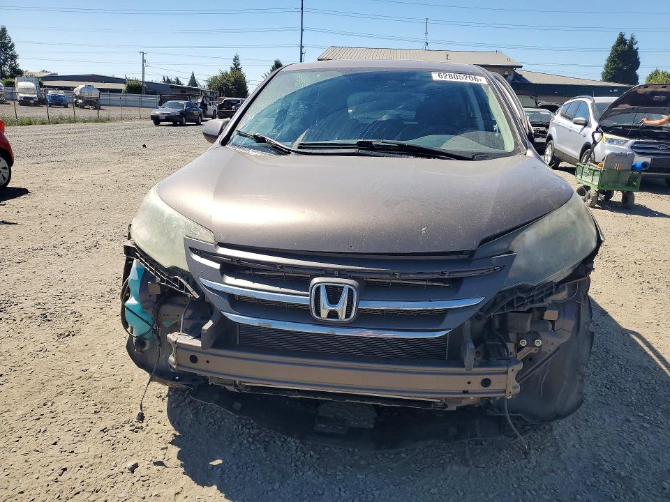 Photo 5 from auction – 2014 HONDA CR-V with VIN 2HKRM4H5XEH634073