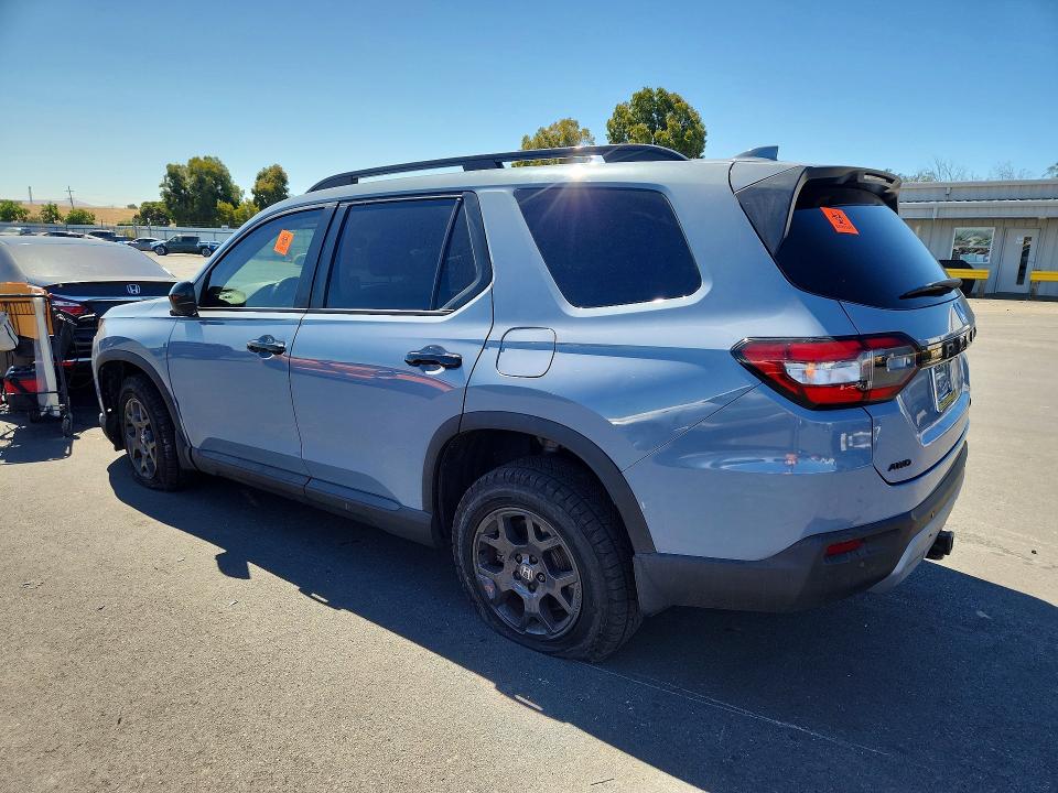 Photo 2 from auction – 2023 HONDA PILOT with VIN 5FNYG1H65PB012508