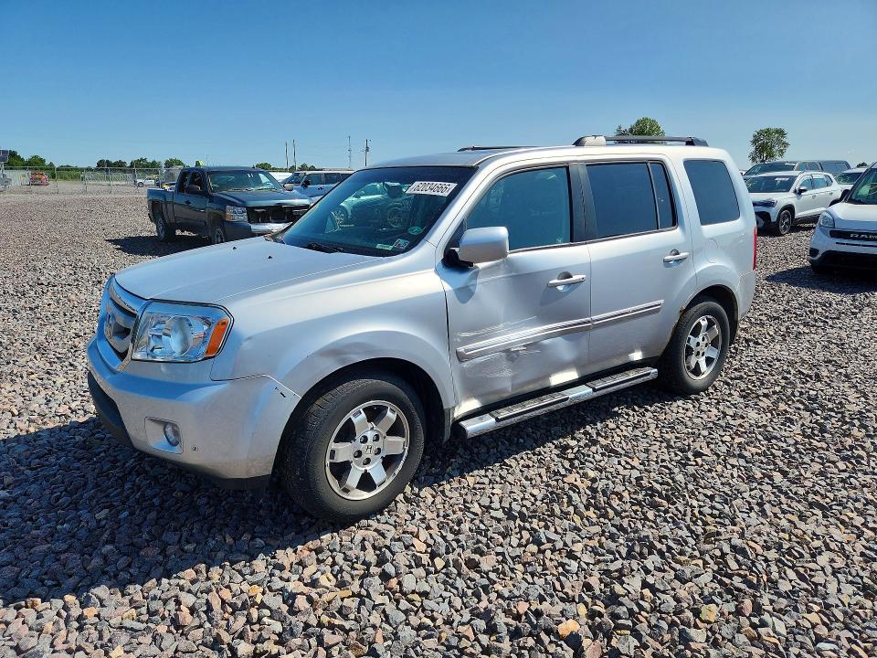 HONDA PILOT 2011 with VIN 5FNYF4H91BB011220 - Photo from auction