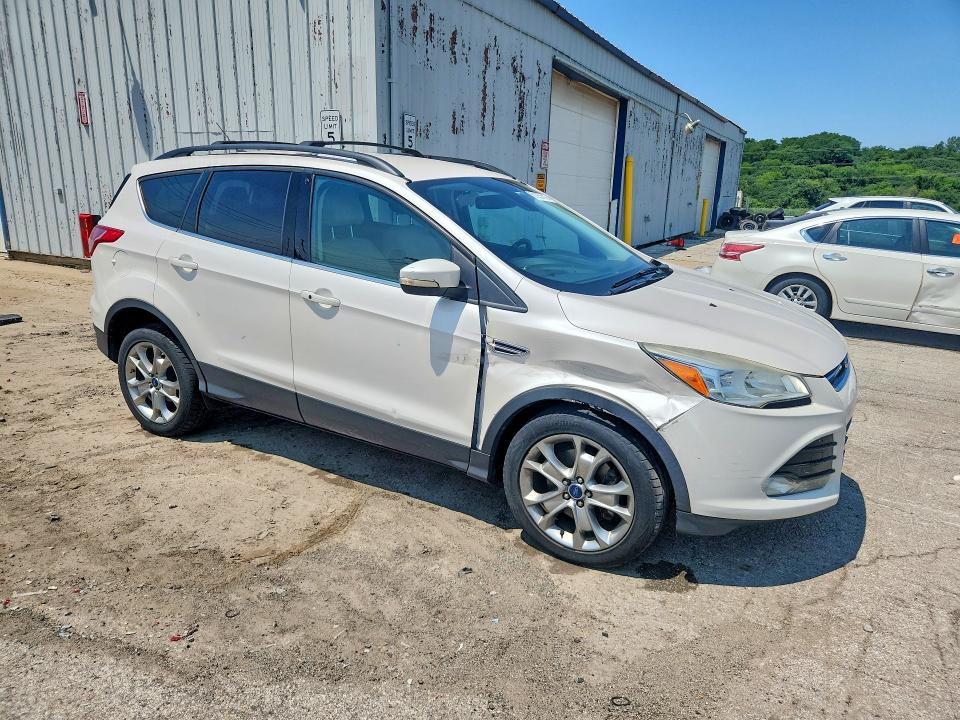 Photo 4 from auction – 2013 FORD ESCAPE with VIN 1FMCU9H90DUB54050