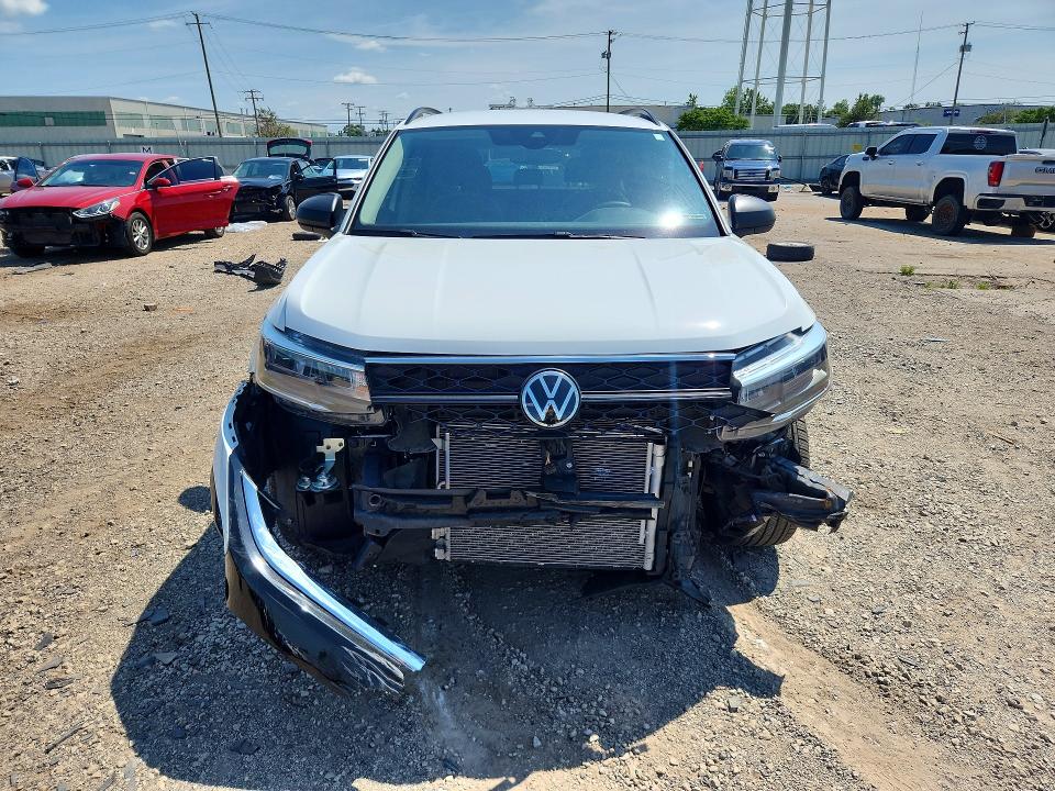 Photo 5 from auction – 2023 VOLKSWAGEN TAOS with VIN 3VVDX7B22PM323155