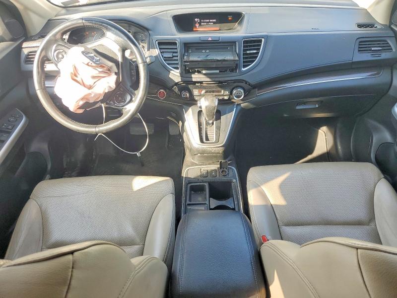 Photo 8 from auction – 2015 HONDA CR-V with VIN 5J6RM4H70FL069468